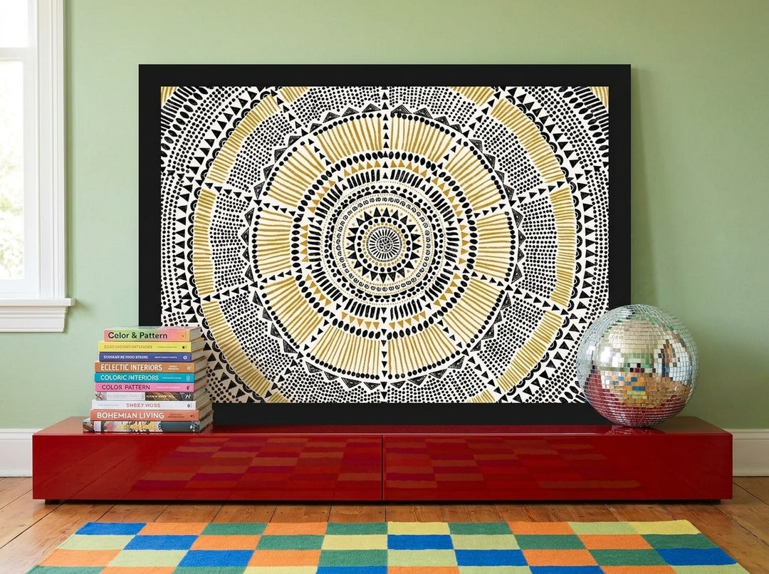 Modern wall art print standing on a sideboard in a colourful eclectic bedroom