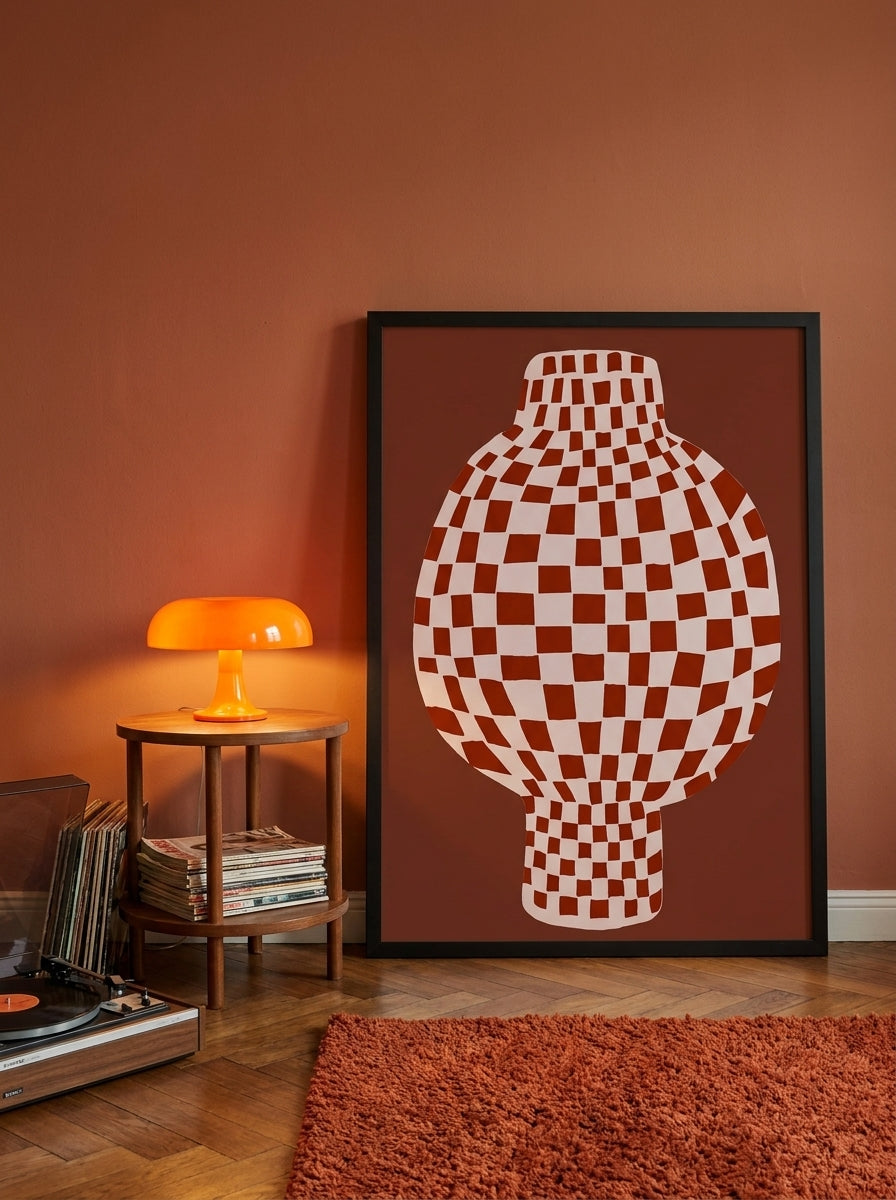 Oversized statement modern wall art print leaning against the wall in a retro 70s dining room