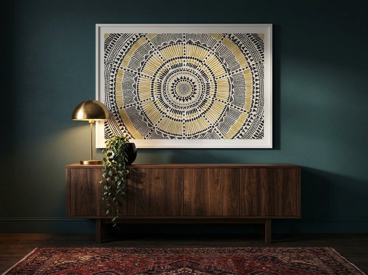 Modern wall art print styled on the wall in a moody living room