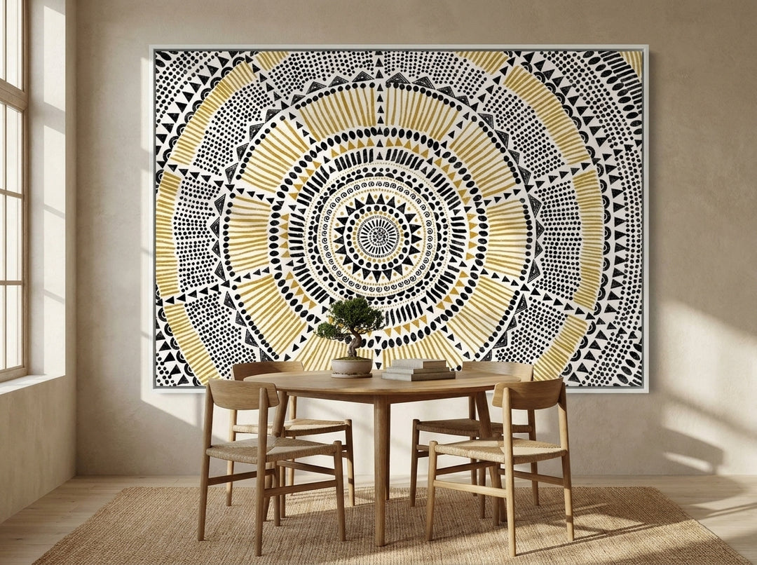 Oversized statement canvas wall art with a white surround styled on the wall in a warm Japandi dining room