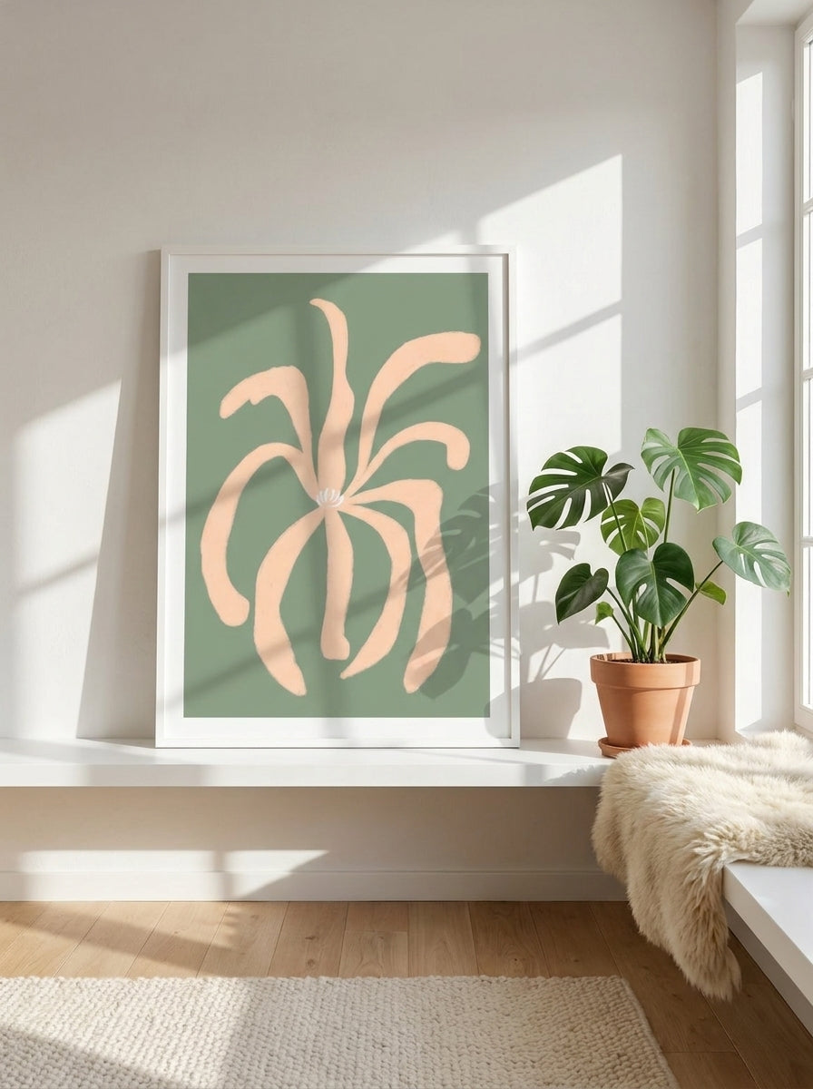Modern wall art print standing on a shelf in a bright Scandinavian home office