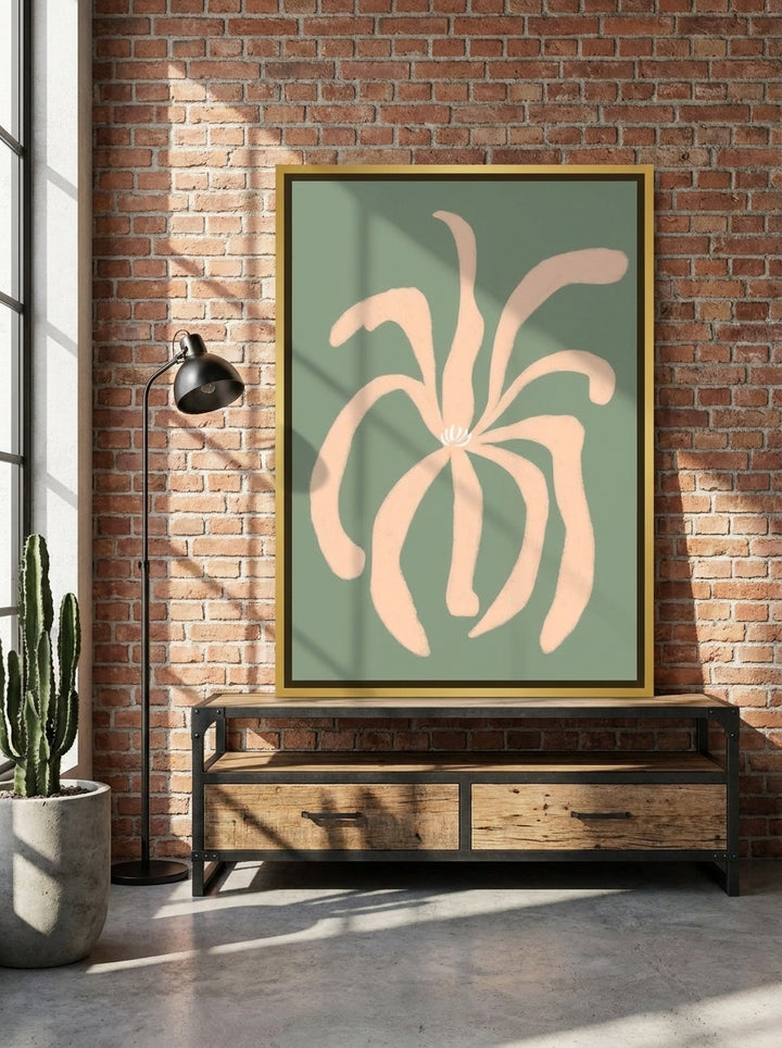 Canvas wall art with a gold leaf surround standing on a console in an industrial loft home office