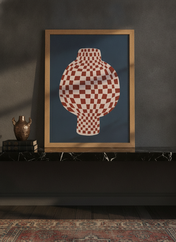 Modern wall art print standing on a kitchen bench in a moody kitchen