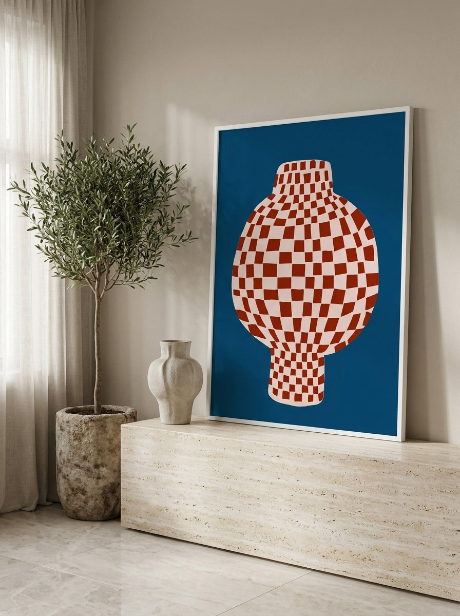 Modern wall art print standing on a console in a luxe living room