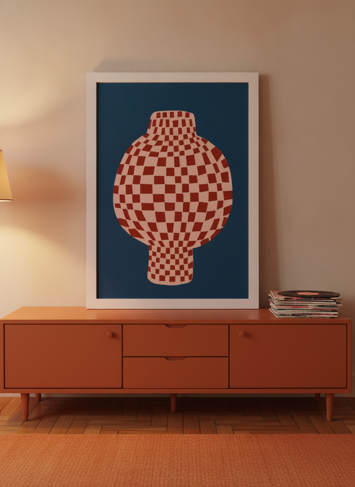 Modern wall art print standing on a sideboard in a retro 70s home office