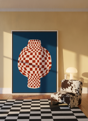 Oversized statement canvas wall art with a white surround leaning against the wall in a colourful eclectic living room