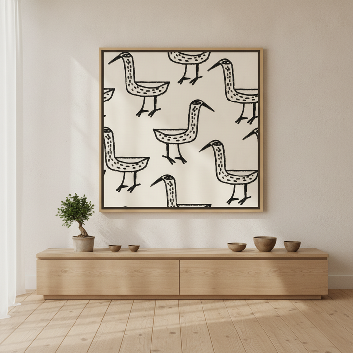 Oversized statement canvas wall art with a natural timber surround styled on the wall in a warm Japandi living room