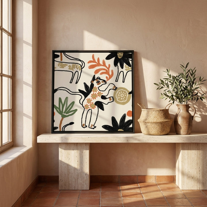 Canvas wall art with a black surround standing on a console in a Mediterranean bedroom