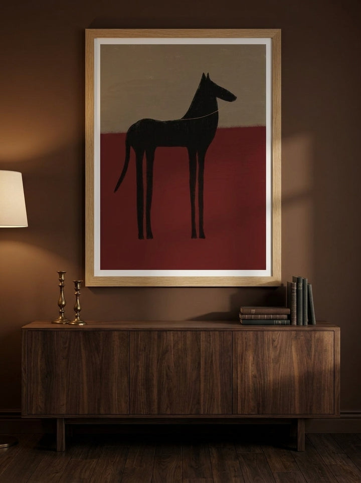 Modern wall art print styled on the wall in a moody living room