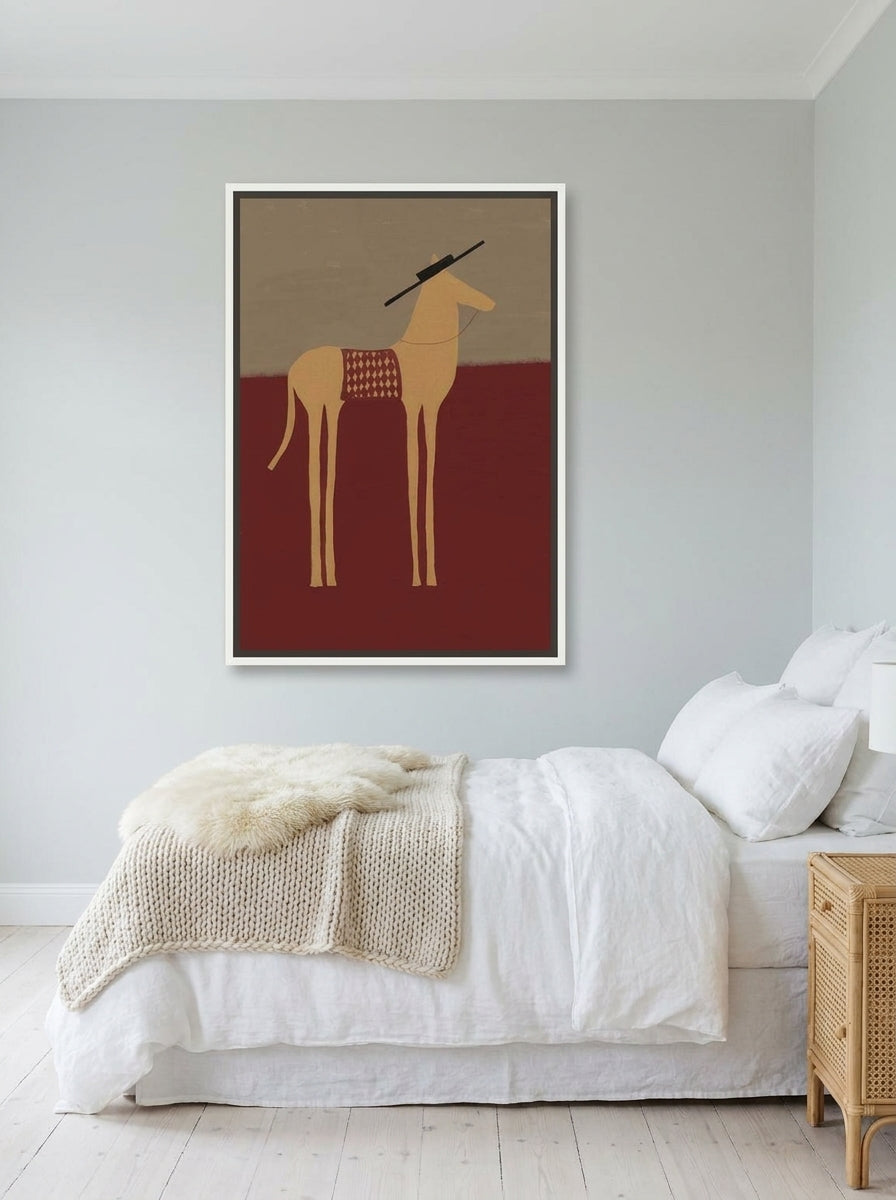 Canvas wall art with a white surround styled on the wall in a bright Scandinavian bedroom