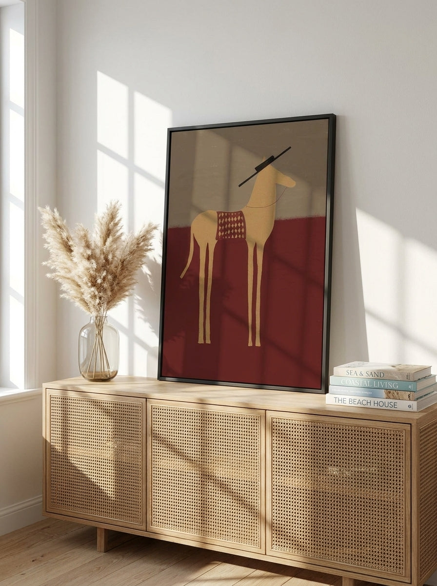 Canvas wall art with a black surround standing on a sideboard in a coastal living room