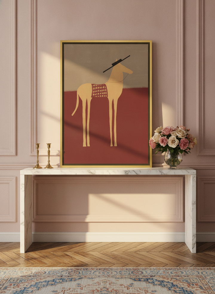 Canvas wall art with a gold leaf surround standing on a console in a Parisian home office