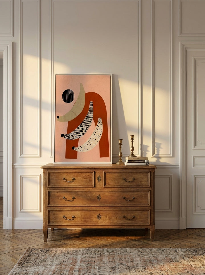Canvas wall art with a white surround standing on a sideboard in a Parisian bathroom