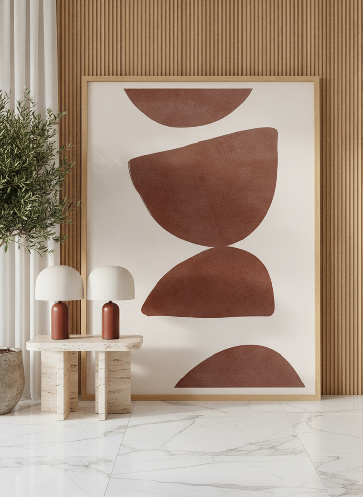Oversized statement modern wall art print leaning against the wall in a luxe living room