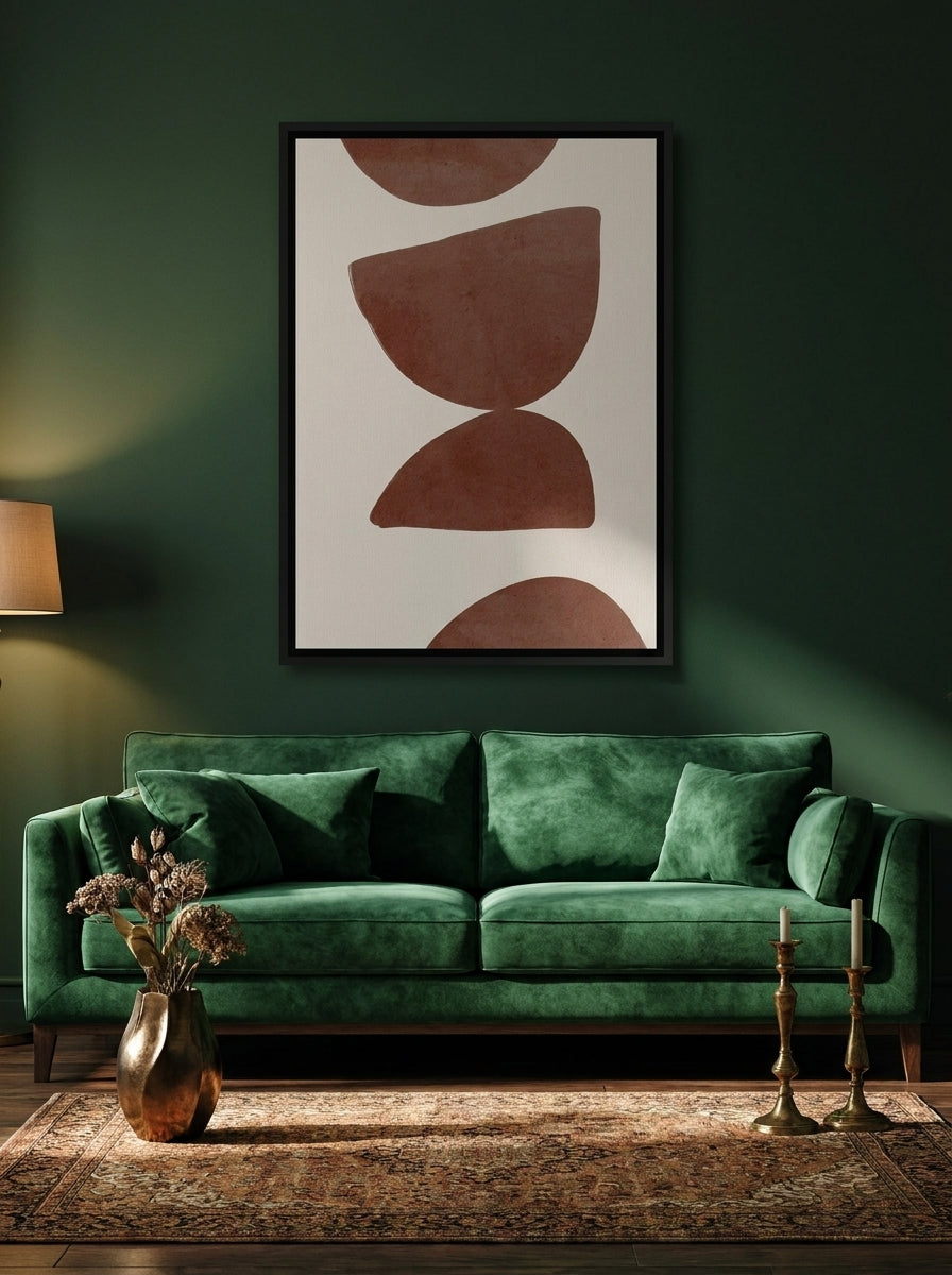 Canvas wall art with a black surround styled on the wall in a moody living room