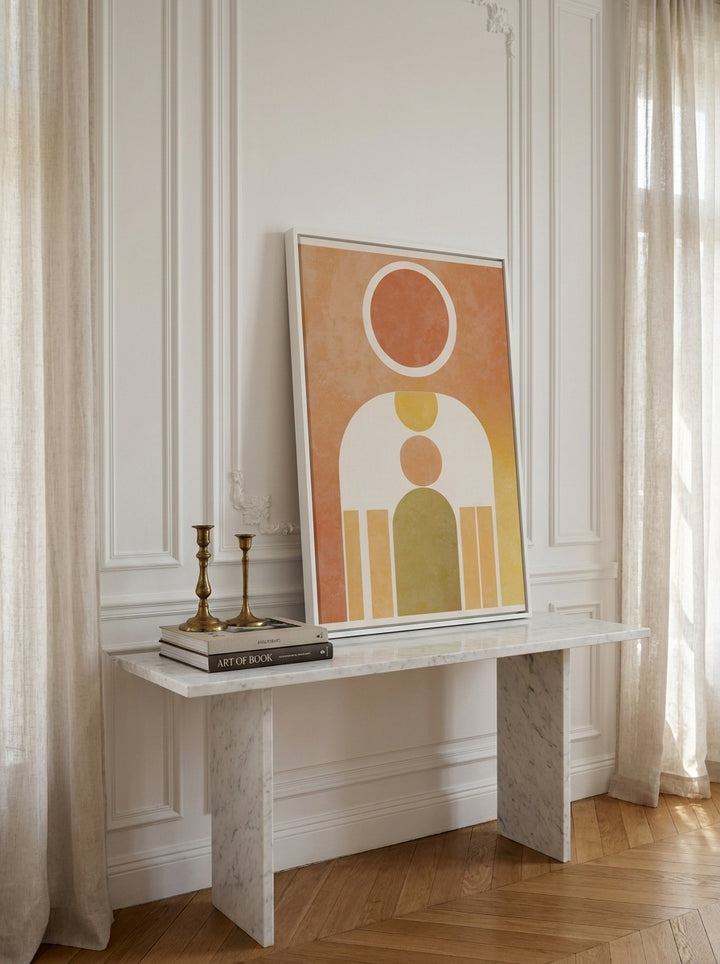 Canvas wall art with a white surround standing on a console in a Parisian home office