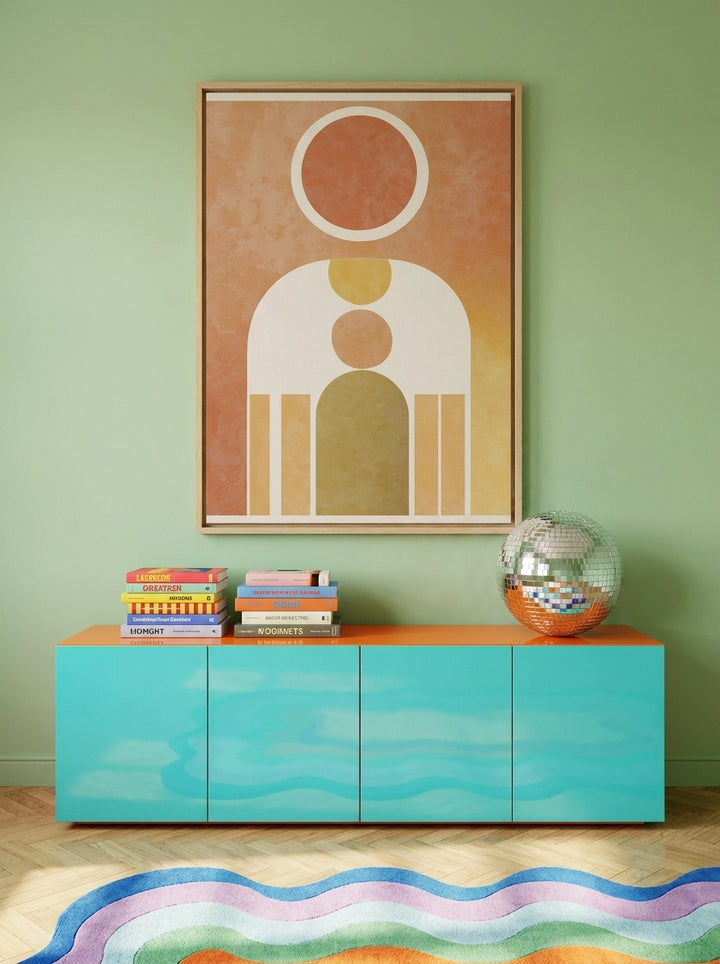 Oversized statement canvas wall art with a natural timber surround styled on the wall in a colourful eclectic living room