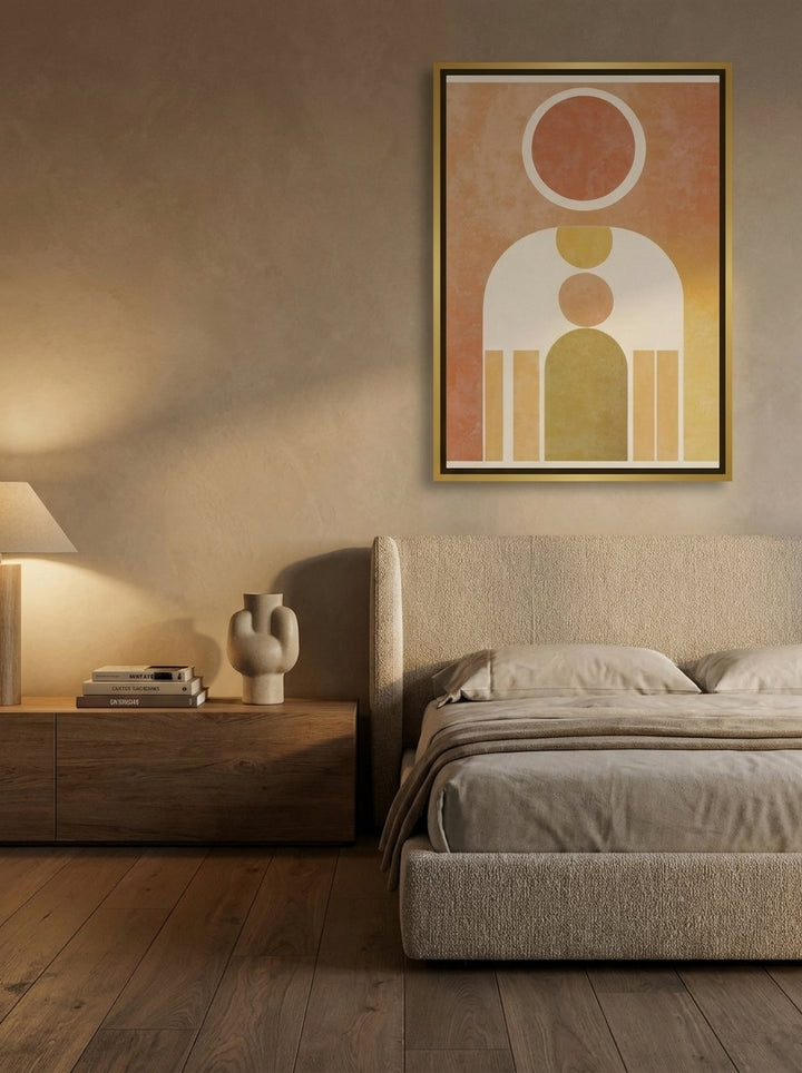 Canvas wall art with a gold leaf surround styled on the wall in a luxe bedroom
