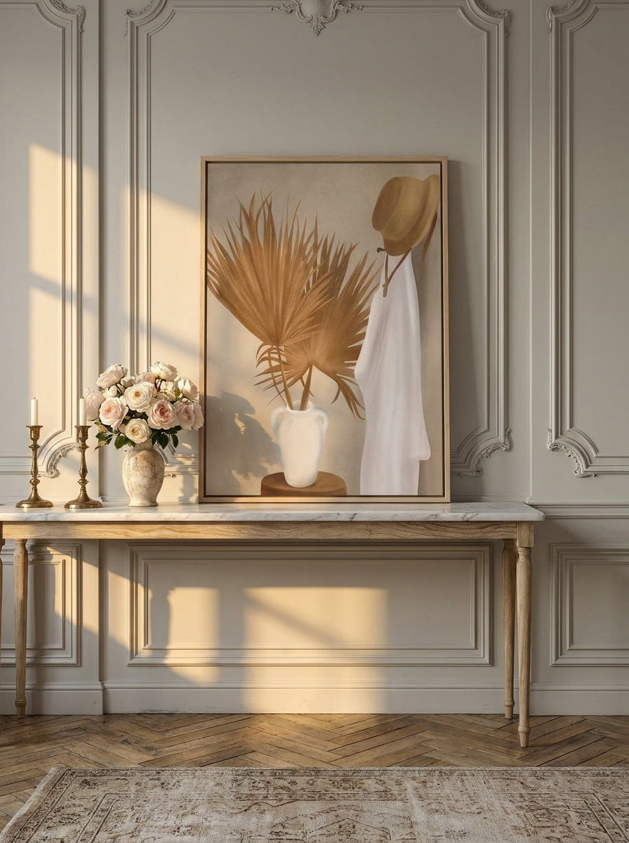 Canvas wall art with a natural timber surround standing on a console in a Parisian bathroom