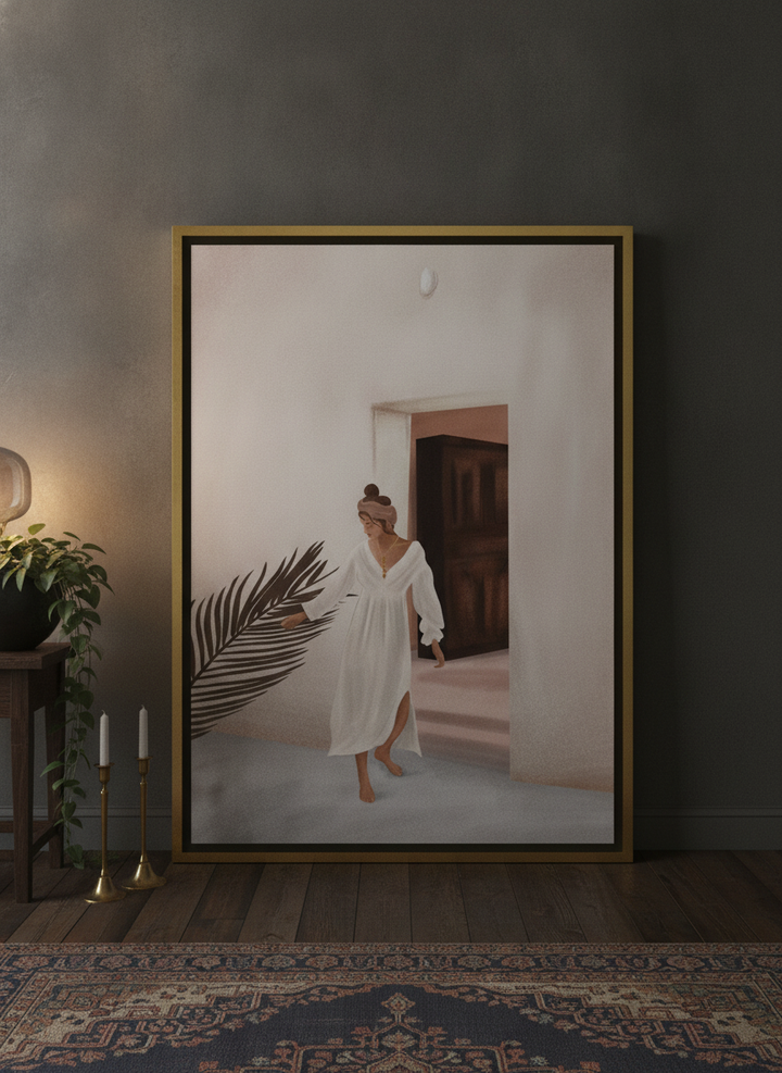 Canvas wall art with a gold leaf surround leaning against the wall in a moody bedroom