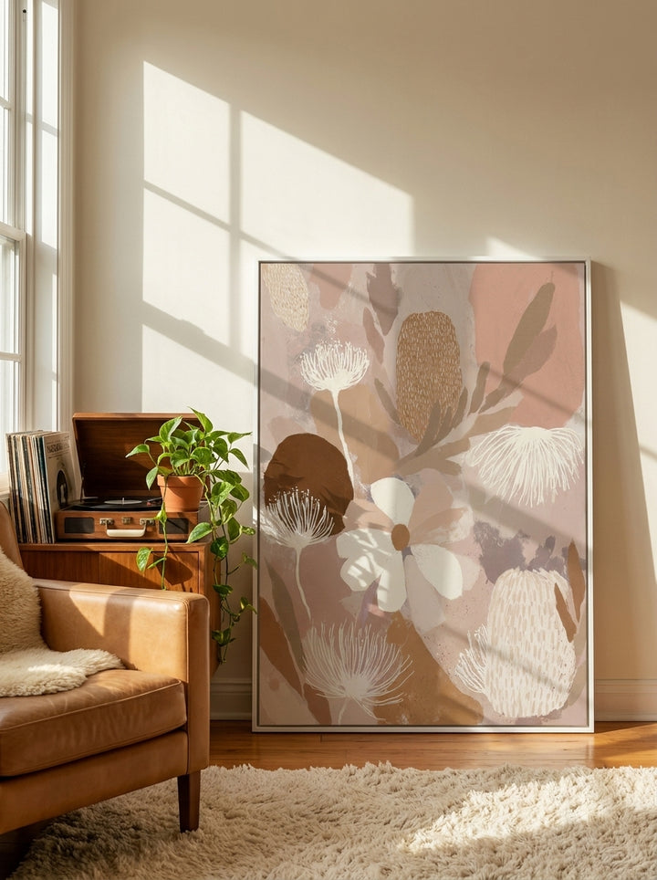 Canvas wall art with a white surround leaning against the wall in a retro 70s home office
