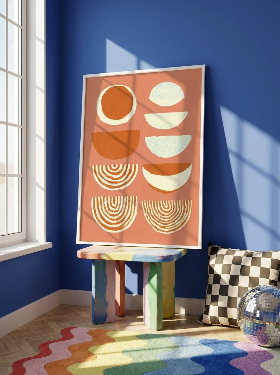 Modern wall art print standing on a side table in a colourful eclectic living room