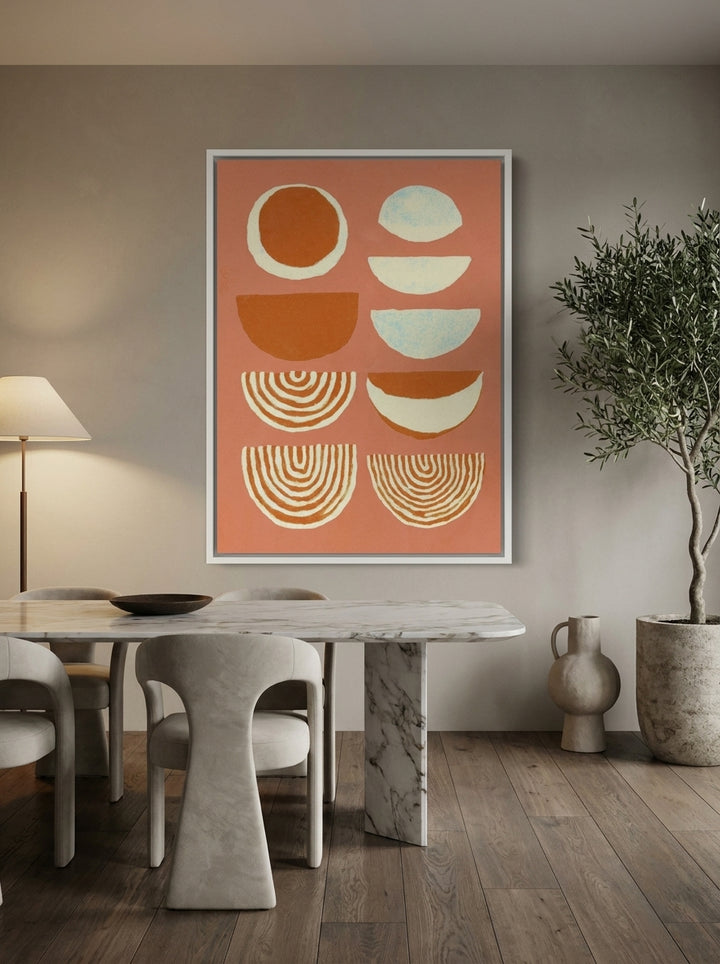 Oversized statement canvas wall art with a white surround styled on the wall in a luxe dining room