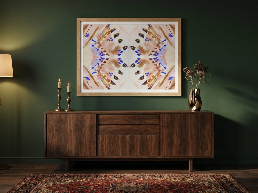 Modern wall art print styled on the wall in a moody living room
