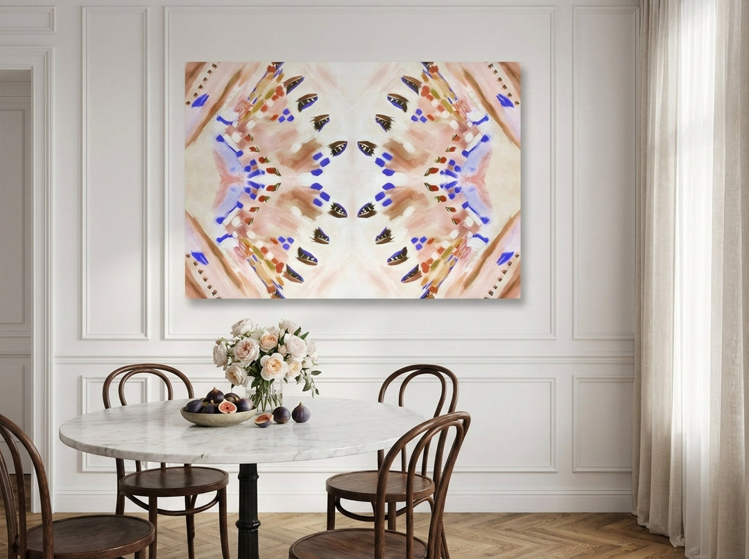 Stretched canvas wall art styled on the wall in a Parisian dining room