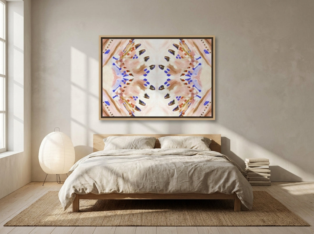 Canvas wall art with a natural timber surround styled on the wall in a warm Japandi bedroom