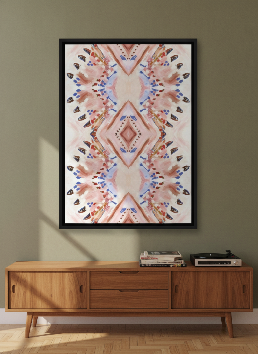 Canvas wall art with a black surround styled on the wall in a mid-century living room