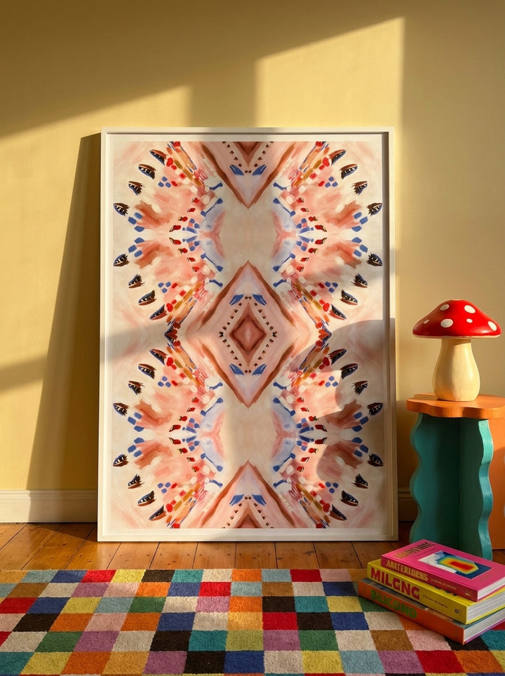 Oversized statement modern wall art print leaning against the wall in a colourful eclectic living room
