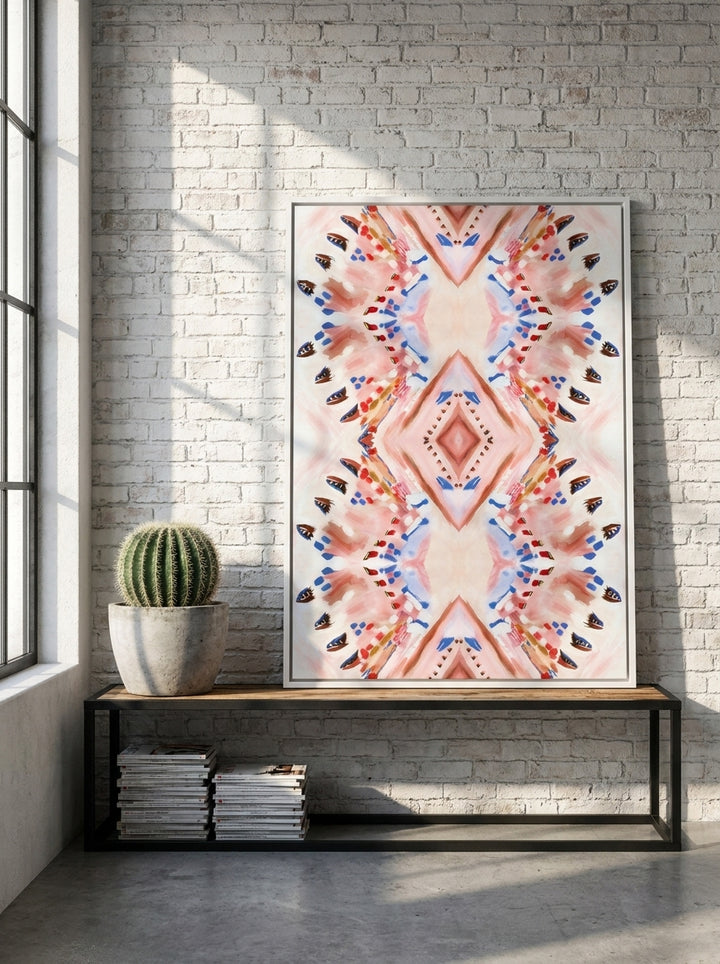 Canvas wall art with a white surround standing on a console in an industrial loft bedroom