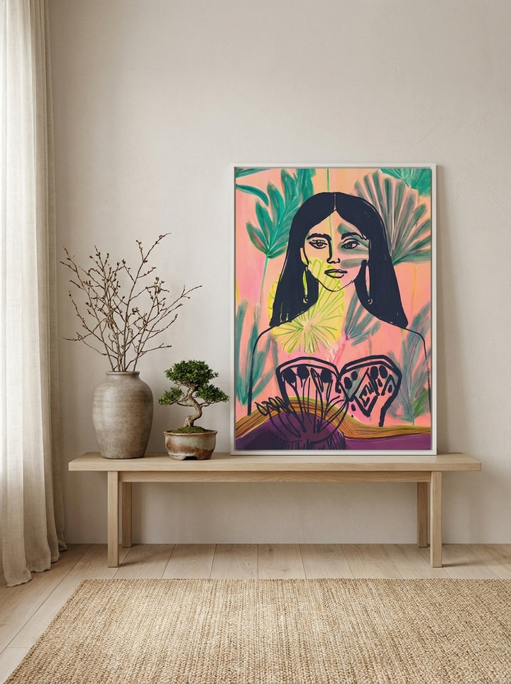 Canvas wall art with a white surround standing on a bench in a warm Japandi bedroom