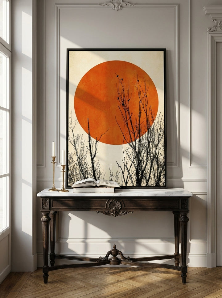 Canvas wall art with a black surround standing on a console in a Parisian living room