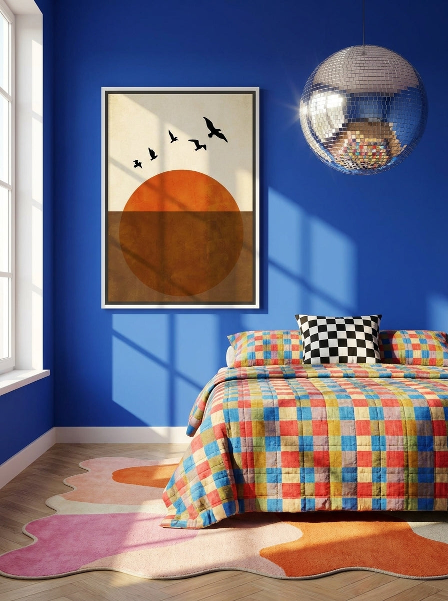 Canvas wall art with a white surround styled on the wall in a colourful eclectic bedroom