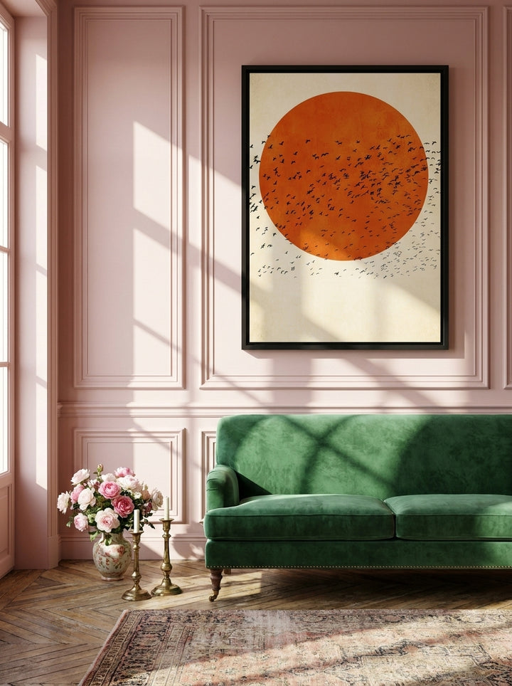 Canvas wall art with a black surround styled on the wall in a Parisian living room