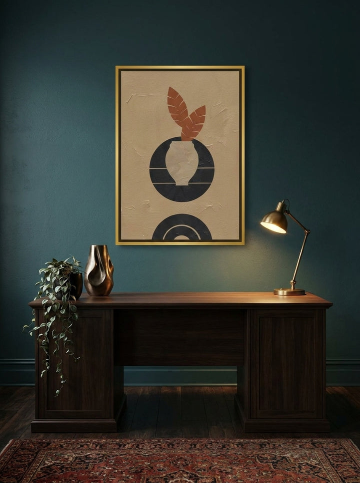 Canvas wall art with a gold leaf surround styled on the wall in a moody home office