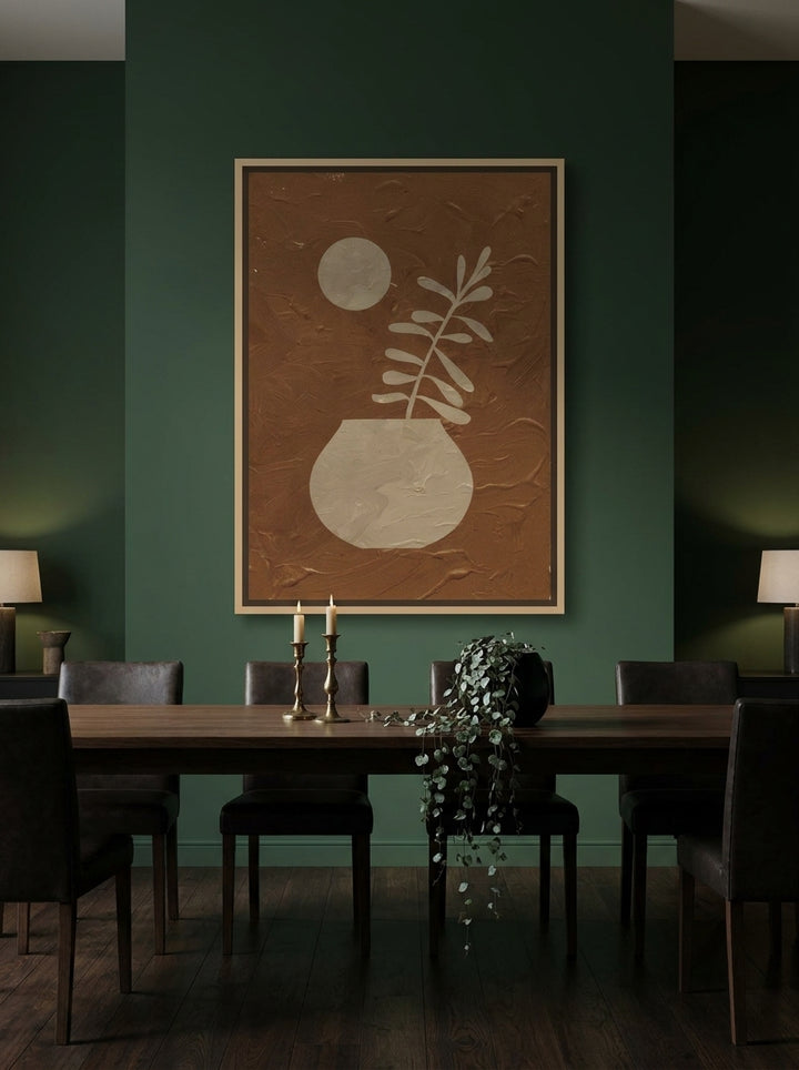 Oversized statement canvas wall art with a natural timber surround styled on the wall in a moody dining room