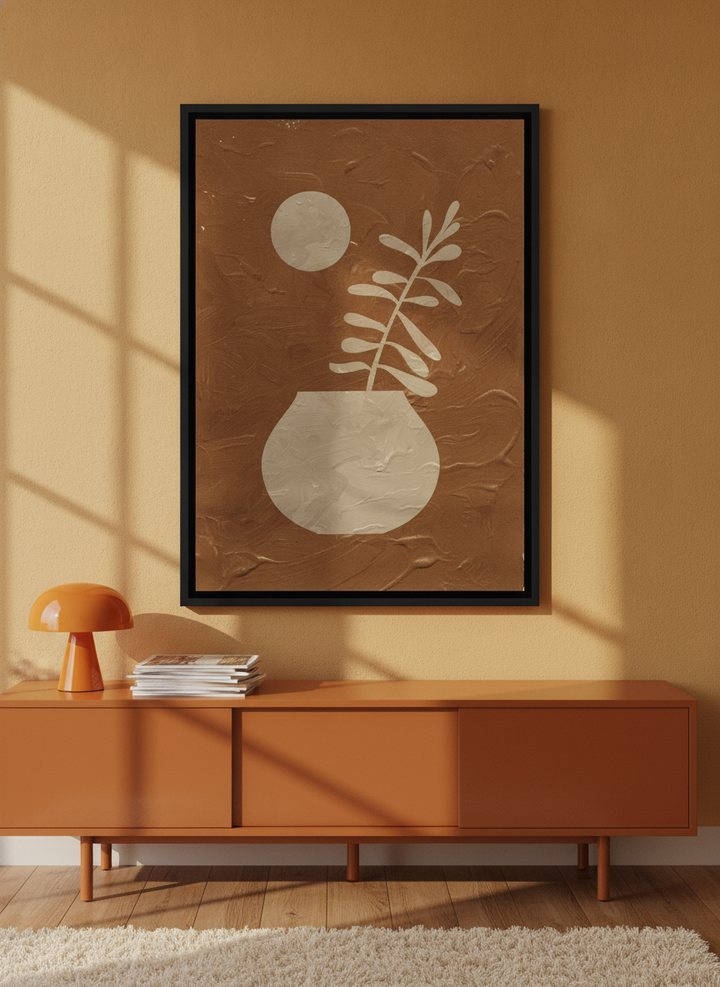 Canvas wall art with a black surround styled on the wall in a retro 70s living room