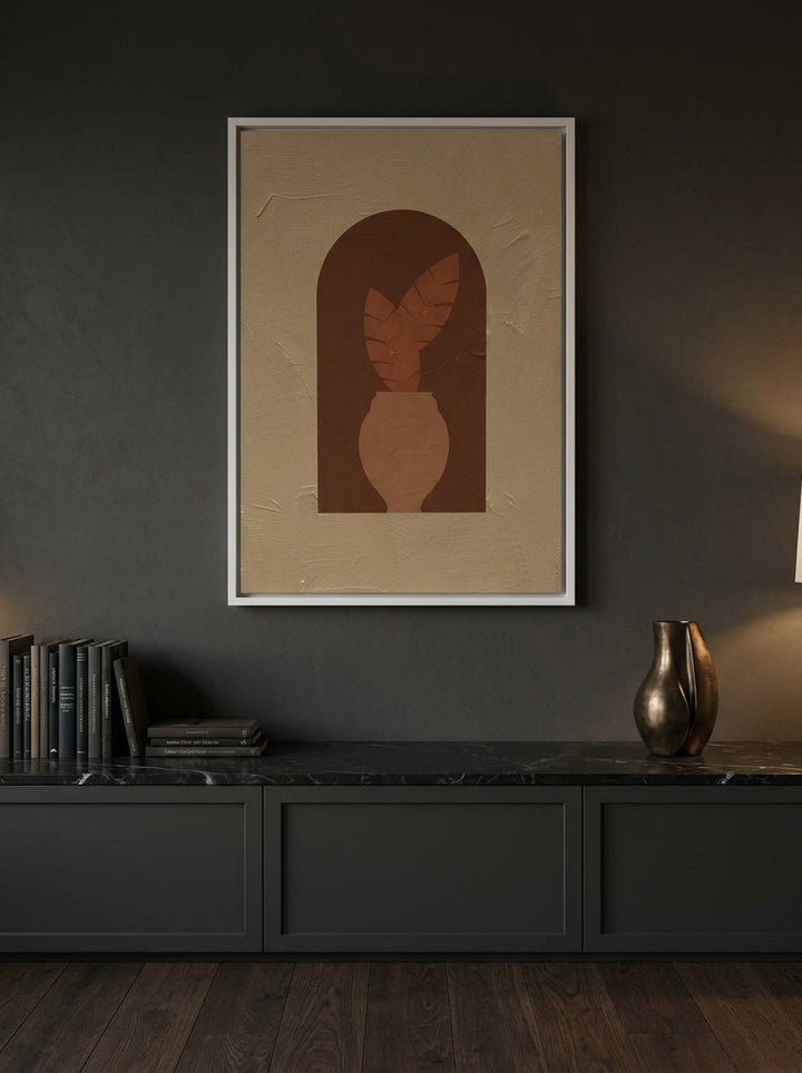 Canvas wall art with a white surround styled on the wall in a moody kitchen