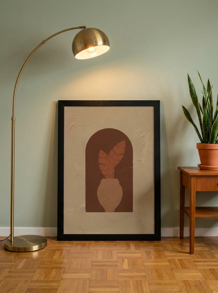 Modern wall art print leaning against the wall in a mid-century kitchen