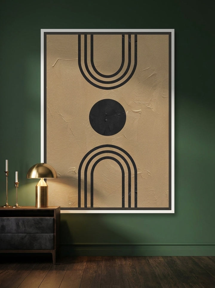 Canvas wall art with a white surround styled on the wall in a moody bedroom