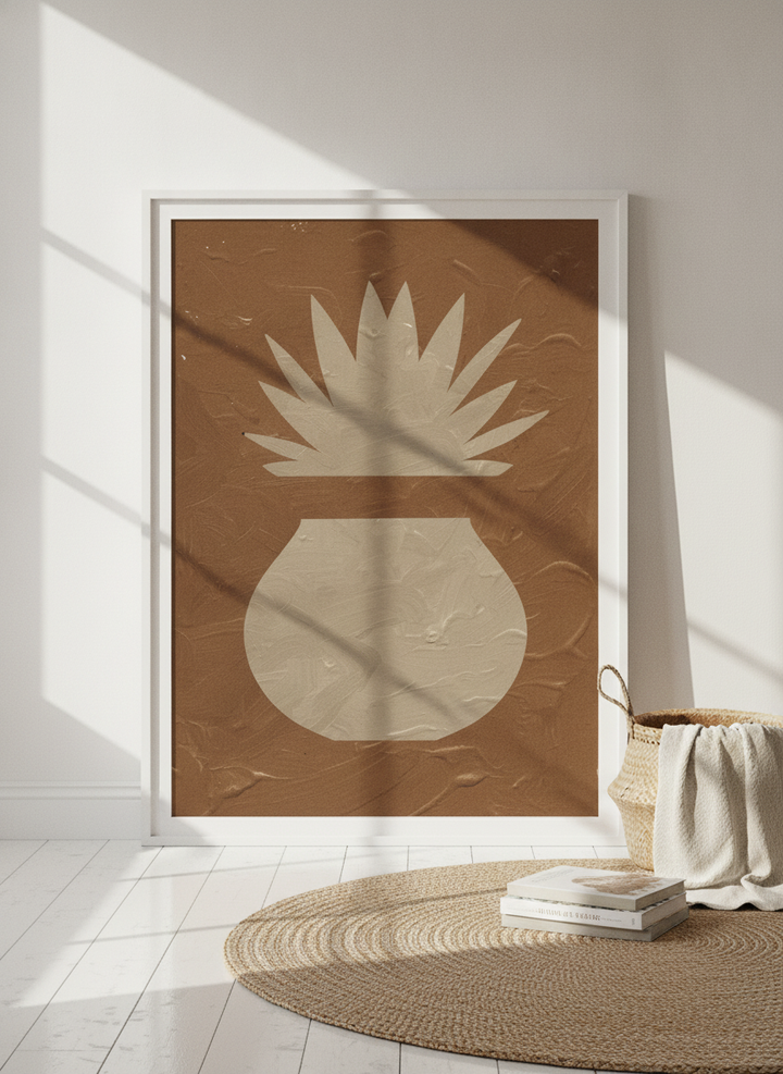 Modern wall art print leaning against the wall in a coastal bedroom