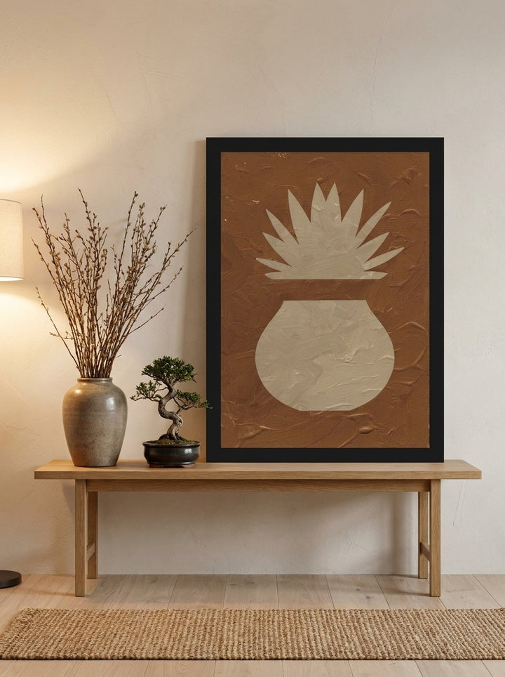 Modern wall art print standing on a bench in a warm Japandi bedroom