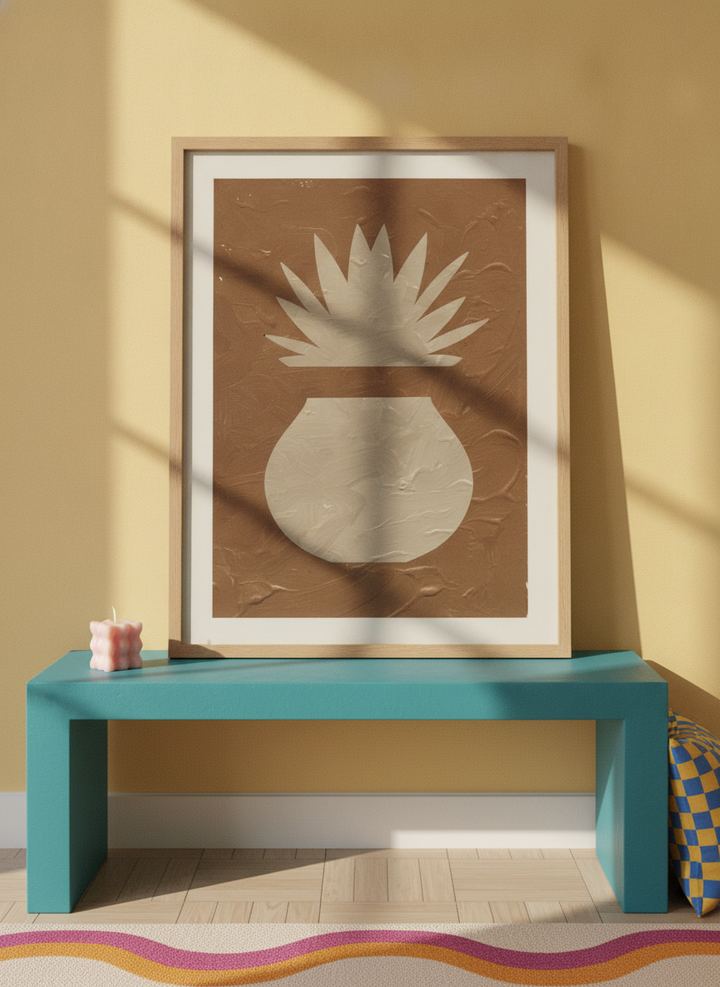 Modern wall art print standing on a side table in a colourful eclectic home office