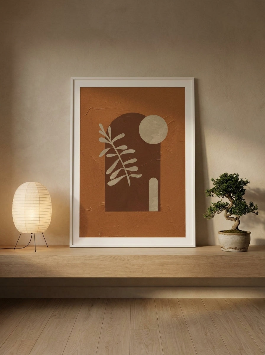 Modern wall art print standing on a shelf in a warm Japandi home office