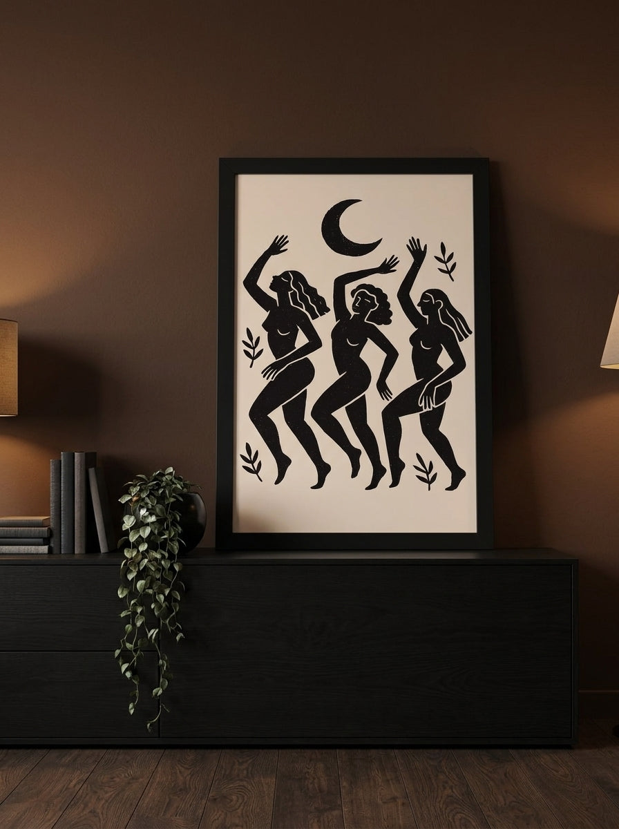 Modern wall art print standing on a console in a moody home office