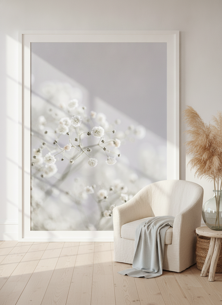 Oversized statement modern wall art print leaning against the wall in a coastal living room