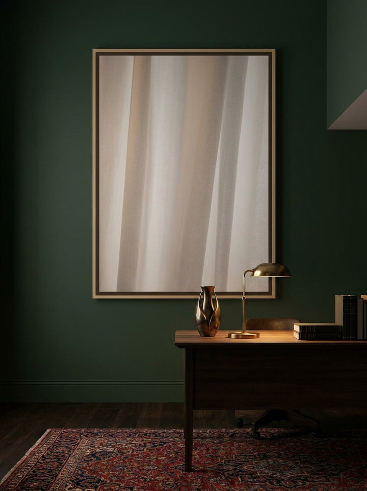 Oversized statement canvas wall art with a natural timber surround styled on the wall in a moody home office